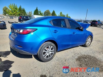 Trzecie zdjęcie samochodu z tyłu: 2018 TOYOTA YARIS IA BASE VIN:3MYDLBYV1JY323082 - miniatura