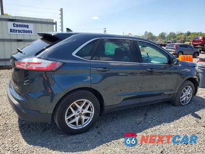 Trzecie zdjęcie samochodu z tyłu: 2023 FORD EDGE SEL VIN:2FMPK4J99PBA36657 - miniatura