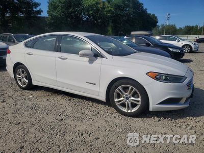 Czwarte zdjęcie samochodu z boku: 2018 FORD FUSION SE HYBRID VIN:3FA6P0LU0JR163517 - miniatura
