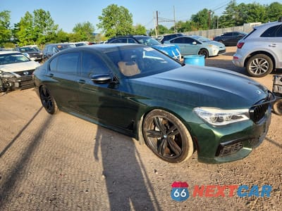 Czwarte zdjęcie samochodu z boku: 2018 BMW 750 XI VIN:WBA7F2C50JB238725 - miniatura