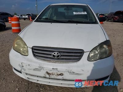 Zdjęcie 13 z 34 samochodu: 2003 TOYOTA COROLLA CE VIN:1NXBR32E53Z074371 - miniatura