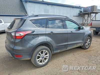 Trzecie zdjęcie samochodu z tyłu: 2017 FORD ESCAPE SE VIN:1FMCU9GD0HUF06166 - miniatura