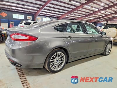 Trzecie zdjęcie samochodu z tyłu: 2013 FORD FUSION SE VIN:3FA6P0H94DR213084 - miniatura