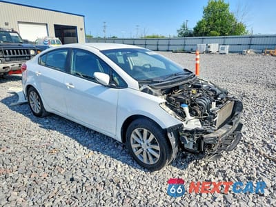 Czwarte zdjęcie samochodu z boku: 2015 KIA FORTE LX VIN:KNAFX4A67F5355286 - miniatura