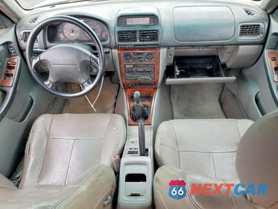 Zdjęcie 8 z 12 samochodu: 1999 SUBARU FORESTER S VIN:JF1SF655XXG748535 - miniatura