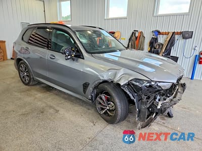 Czwarte zdjęcie samochodu z boku: 2026 BMW X5 XDRIVE40I VIN:5UX23EU0XT9058932 - miniatura