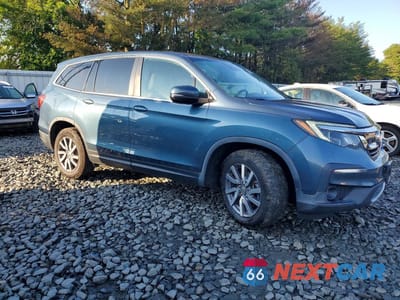 Czwarte zdjęcie samochodu z boku: 2020 HONDA PILOT EX VIN:5FNYF5H3XLB018606 - miniatura