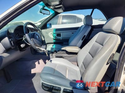 Zdjęcie 7 z 12 samochodu: 1999 BMW 323 IC AUTOMATIC VIN:WBABJ8332XEM24381 - miniatura