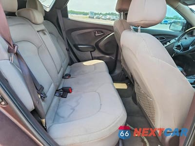 Zdjęcie 11 z 13 samochodu: 2014 HYUNDAI TUCSON GLS VIN:KM8JT3AFXEU850357 - miniatura