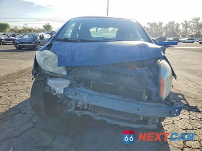 Piąte zdjęcie samochodu w środku: 2009 TOYOTA YARIS S VIN:JTDJT903395235793 - miniatura