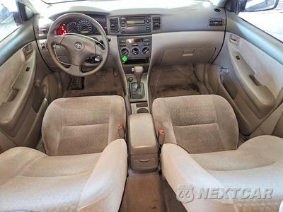 Zdjęcie 8 z 13 samochodu: 2004 TOYOTA COROLLA CE VIN:JTDBR32E742040661 - miniatura