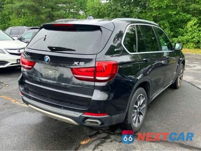 Czwarte zdjęcie samochodu z boku: 2017 BMW X5 XDR40E VIN:5UXKT0C31H0S81452 - miniatura