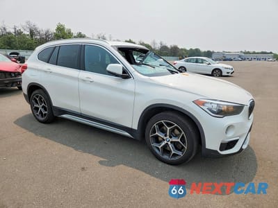 Czwarte zdjęcie samochodu z boku: 2018 BMW X1 XDRIVE28I VIN:WBXHT3C34J3H30484 - miniatura