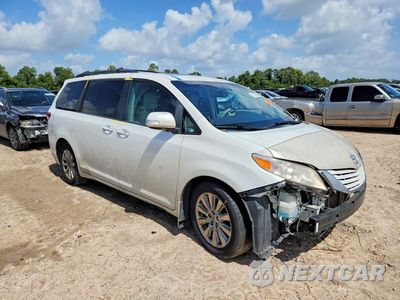 Czwarte zdjęcie samochodu z boku: 2014 TOYOTA SIENNA LIMITED 7-PASSENGER VIN:5TDYK3DC3ES470059 - miniatura