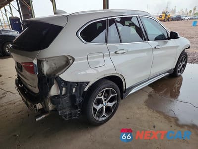 Trzecie zdjęcie samochodu z tyłu: 2019 BMW X1 SDRIVE28I VIN:WBXHU7C5XK5L11662 - miniatura