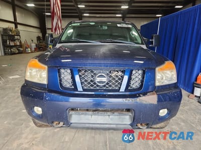 Piąte zdjęcie samochodu w środku: 2012 NISSAN TITAN SV VIN:1N6AA0EC2CN323216 - miniatura