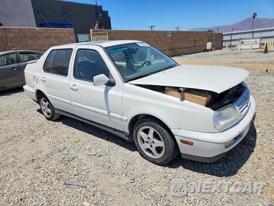 Czwarte zdjęcie samochodu z boku: 1998 VOLKSWAGEN JETTA WOLFSBURG VIN:3VWPB81HXWM252014 - miniatura