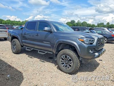 Czwarte zdjęcie samochodu z boku: 2023 TOYOTA TACOMA TRD SPORT VIN:3TMCZ5AN5PM587300 - miniatura
