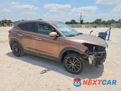 Czwarte zdjęcie samochodu z boku: 2016 HYUNDAI TUCSON LIMITED VIN:KM8J33A26GU071389 - miniatura