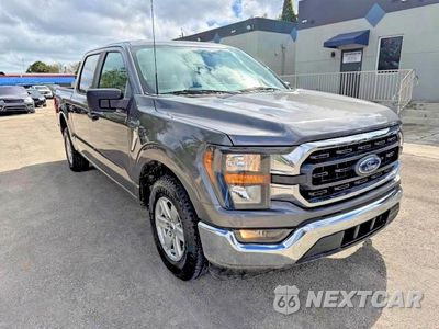 Czwarte zdjęcie samochodu z boku: 2023 FORD F150 SUPERCREW VIN:1FTEW1C86PKD23334 - miniatura