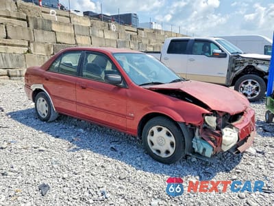 Czwarte zdjęcie samochodu z boku: 2001 MAZDA PROTEGE DX VIN:JM1BJ222X10434766 - miniatura