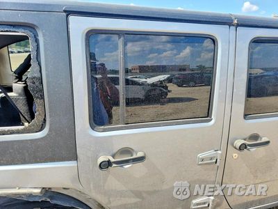 Zdjęcie 10 z 12 samochodu: 2013 JEEP WRANGLER UNLIMITED SPORT VIN:1C4BJWDG6DL553546 - miniatura