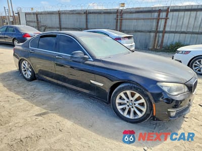 Czwarte zdjęcie samochodu z boku: 2015 BMW 740 I VIN:WBAYA6C5XFD827027 - miniatura