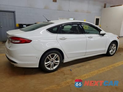 Trzecie zdjęcie samochodu z tyłu: 2018 FORD FUSION SE VIN:3FA6P0HD9JR237848 - miniatura