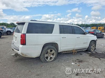 Trzecie zdjęcie samochodu z tyłu: 2017 CHEVROLET SUBURBAN K1500 PREMIER VIN:1GNSKJKC5HR205361 - miniatura