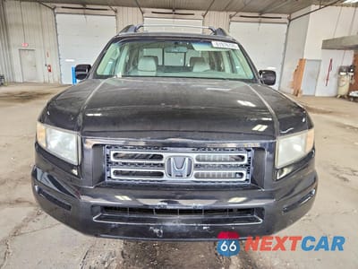 Piąte zdjęcie samochodu w środku: 2006 HONDA RIDGELINE RTL VIN:2HJYK16556H526436 - miniatura