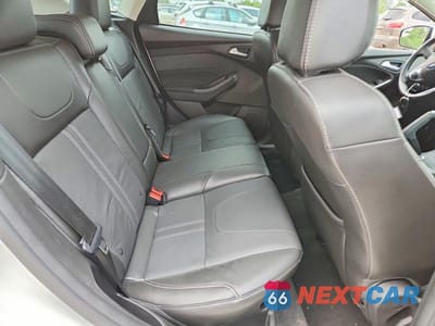 Zdjęcie 10 z 12 samochodu: 2014 FORD FOCUS TITANIUM VIN:1FADP3N27EL439510 - miniatura