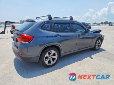 Trzecie zdjęcie samochodu z tyłu: 2013 BMW X1 SDRIVE28I VIN:WBAVM1C52DVW44810 - miniatura