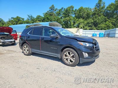 Czwarte zdjęcie samochodu z boku: 2018 CHEVROLET EQUINOX LT VIN:3GNAXKEXXJL281110 - miniatura
