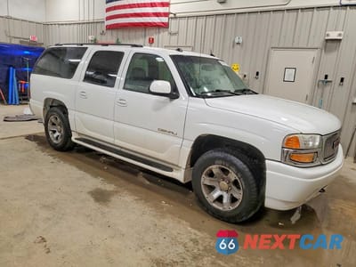 Czwarte zdjęcie samochodu z boku: 2005 GMC YUKON XL DENALI VIN:1GKFK66U45J190117 - miniatura