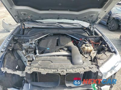 Zdjęcie 12 z 14 samochodu: 2018 BMW X5 SDRIVE35I VIN:5UXKR2C5XJ0Z20462 - miniatura