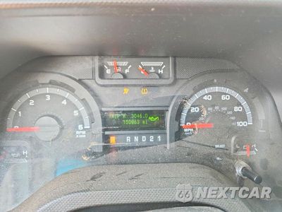 Zdjęcie 9 z 13 samochodu: 2014 FORD E150 DELIVERY VAN VIN:1FTNE1EW7EDA93643 - miniatura