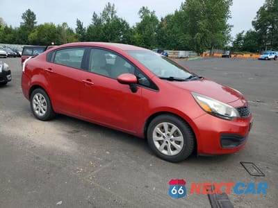 Czwarte zdjęcie samochodu z boku: 2013 KIA RIO LX VIN:KNADM4A30D6312437 - miniatura