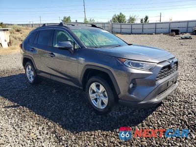 Czwarte zdjęcie samochodu z boku: 2019 TOYOTA RAV4 HYBRID XLE VIN:JTMRWRFV2KD504543 - miniatura
