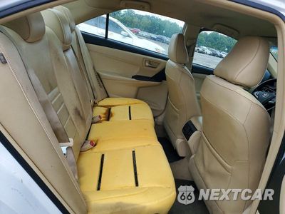 Zdjęcie 10 z 12 samochodu: 2015 TOYOTA CAMRY HYBRID XLE VIN:4T1BD1FK0FU155382 - miniatura