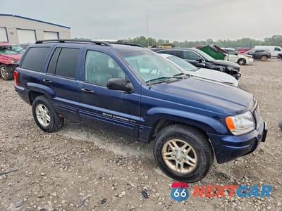 Czwarte zdjęcie samochodu z boku: 2004 JEEP GRAND CHEROKEE LAREDO VIN:1J4GW48S04C339351 - miniatura