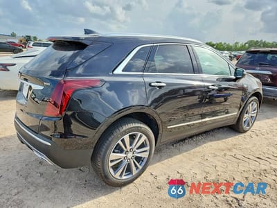 Trzecie zdjęcie samochodu z tyłu: 2026 CADILLAC XT5 PREMIUM LUXURY VIN:1GYKNCRS4TZ110804 - miniatura