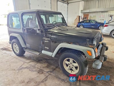 Czwarte zdjęcie samochodu z boku: 1999 JEEP WRANGLER / TJ SPORT VIN:1J4FY19S0XP471865 - miniatura
