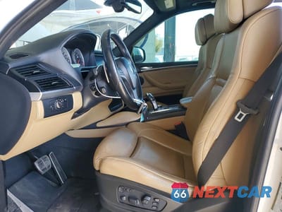 Zdjęcie 7 z 13 samochodu: 2011 BMW X5 M VIN:5YMGY0C51BLK26927 - miniatura