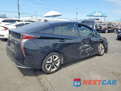 Trzecie zdjęcie samochodu z tyłu: 2018 TOYOTA PRIUS THREE TOURING VIN:JTDKARFU2J3061130 - miniatura