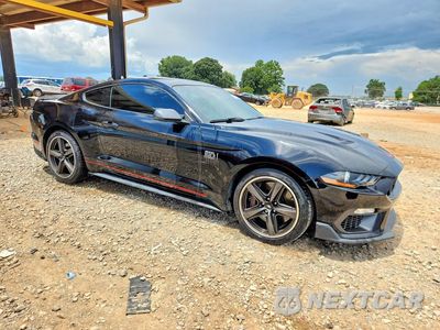 Czwarte zdjęcie samochodu z boku: 2021 FORD MUSTANG MACH I VIN:1FA6P8R05M5555144 - miniatura