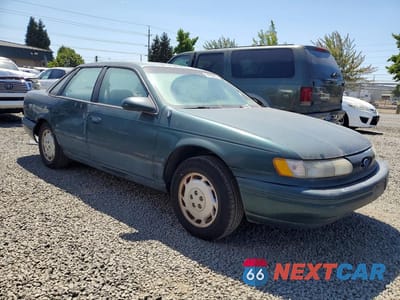 Czwarte zdjęcie samochodu z boku: 1994 FORD TAURUS GL VIN:1FALP52U4RA134528 - miniatura