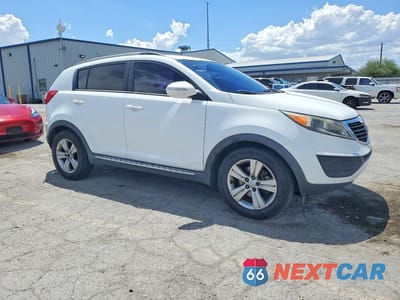 Czwarte zdjęcie samochodu z boku: 2013 KIA SPORTAGE LX VIN:KNDPB3A24D7494175 - miniatura