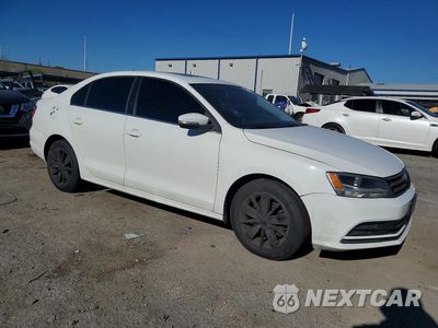 Czwarte zdjęcie samochodu z boku: 2015 VOLKSWAGEN JETTA SE VIN:3VWD17AJ3FM276352 - miniatura