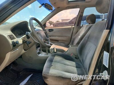 Zdjęcie 7 z 12 samochodu: 2002 TOYOTA COROLLA LE VIN:1NXBR12E52Z641648 - miniatura