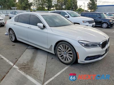 Czwarte zdjęcie samochodu z boku: 2016 BMW 750 XI VIN:WBA7F2C53GG415098 - miniatura